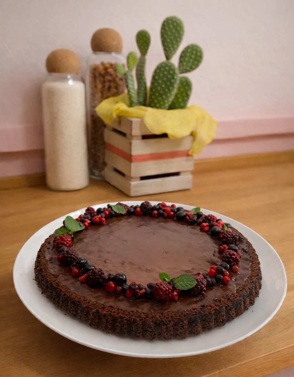 Soft cocoa tart with a berry crown